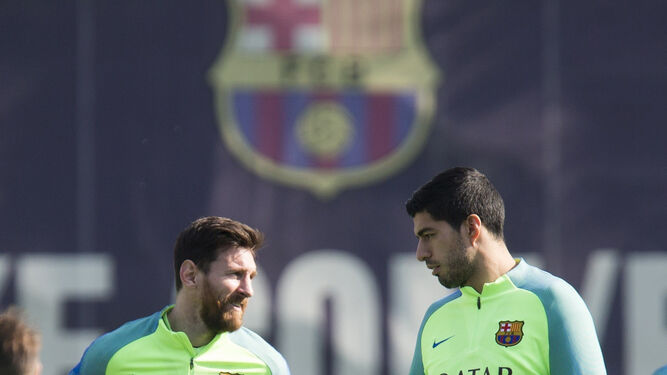 Leo Messi y Luis Suárez.