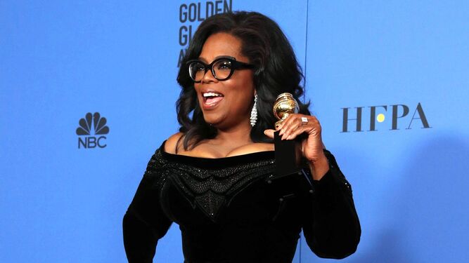 Oprah con su premio Cecil B. DeMille.