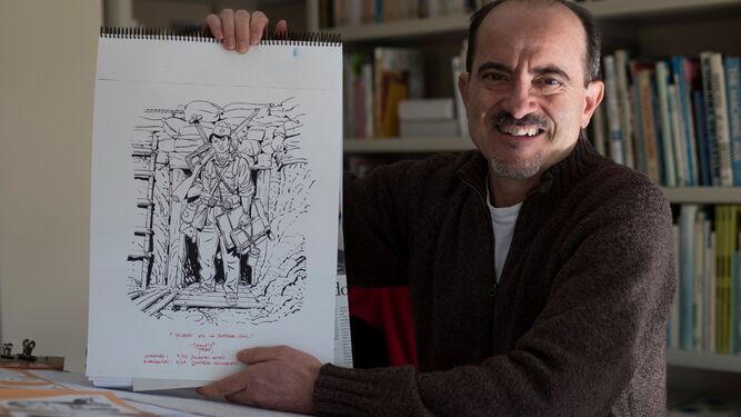 Daniel Torres, con una ilustración del Picasso combatiente.