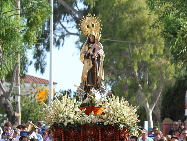 Im&aacute;genes de la procesi&oacute;n de la Virgen del Carmen en Punta Umbr&iacute;a.