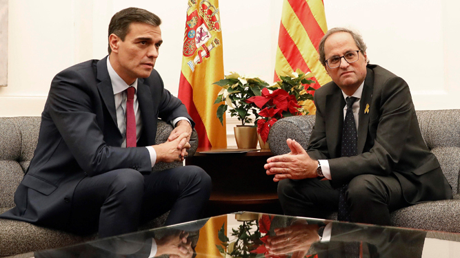 Pedro Sánchez y Quim Torra, durante una reunión en 2018.