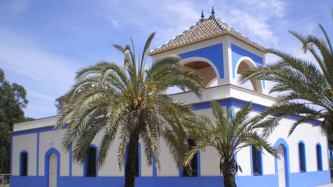 La casita blanca y azul que da nombre a una playa 'de bandera' en Huelva
