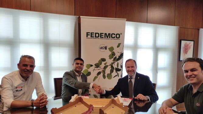 Firma del convenio entre Fedemco e Interfresa.