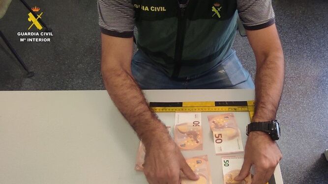 Detienen a una banda criminal que usaba billetes falsos para comprar establecimientos en Huelva